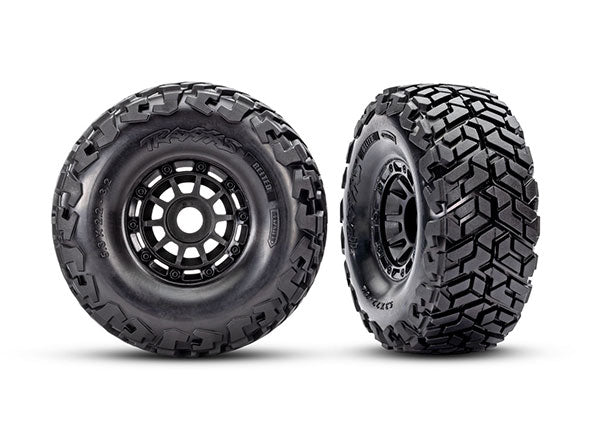TRA10272, Traxxas Tires & wheels, assembled, glued, left (1), right (1) (black wheels, Maxx Slash® belted tires, foam inserts) (17mm splined) (TSM® rated)
