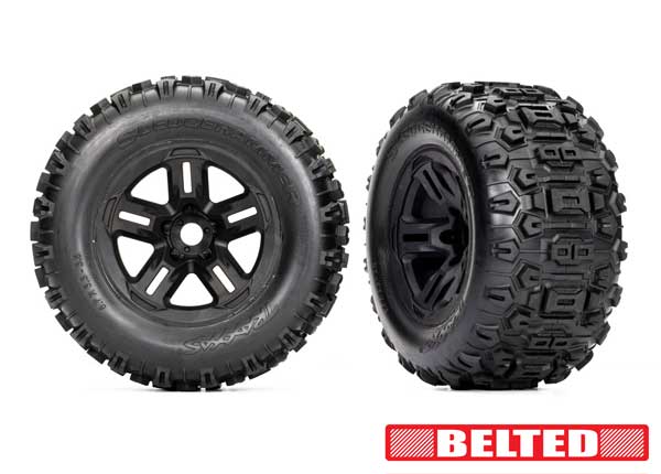 TRA9573, Tires & wheels, assembled, glued (3.8" black wheels, belted Sledgehammer® tires, foam inserts) (2)
