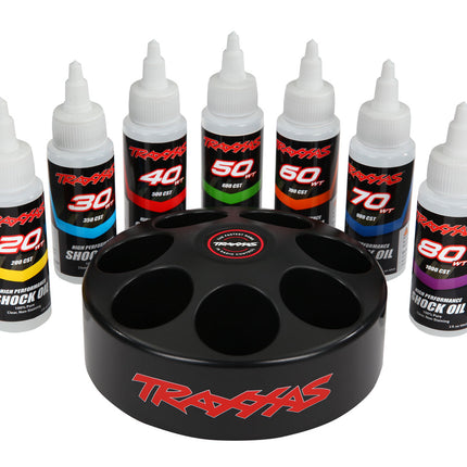 TRA5038X, Shock oil set (includes 20 wt, 30 wt, 40 wt, 50 wt, 60 wt, 70 wt, & 80 wt premium shock oils with spinning carousel rack)