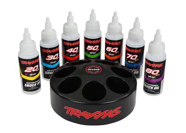 TRA5038X, Shock oil set (includes 20 wt, 30 wt, 40 wt, 50 wt, 60 wt, 70 wt, & 80 wt premium shock oils with spinning carousel rack)