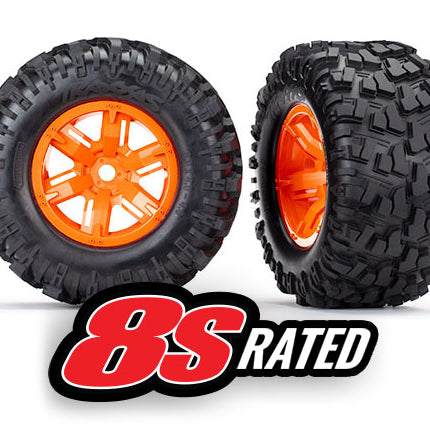 7772T - Tires & wheels, assembled, glued (X-Maxx® orange wheels, Maxx® AT tires, foam inserts) (left & right) (2)