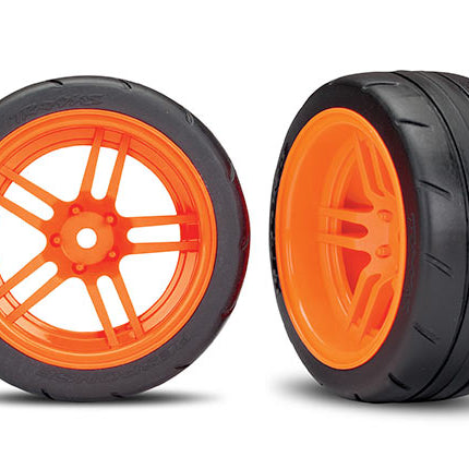 TRA8374A, Tires and wheels, assembled, glued (split-spoke orange wheels, 1.9' Response tires) (extra wide, rear) (2) (VXL rated)